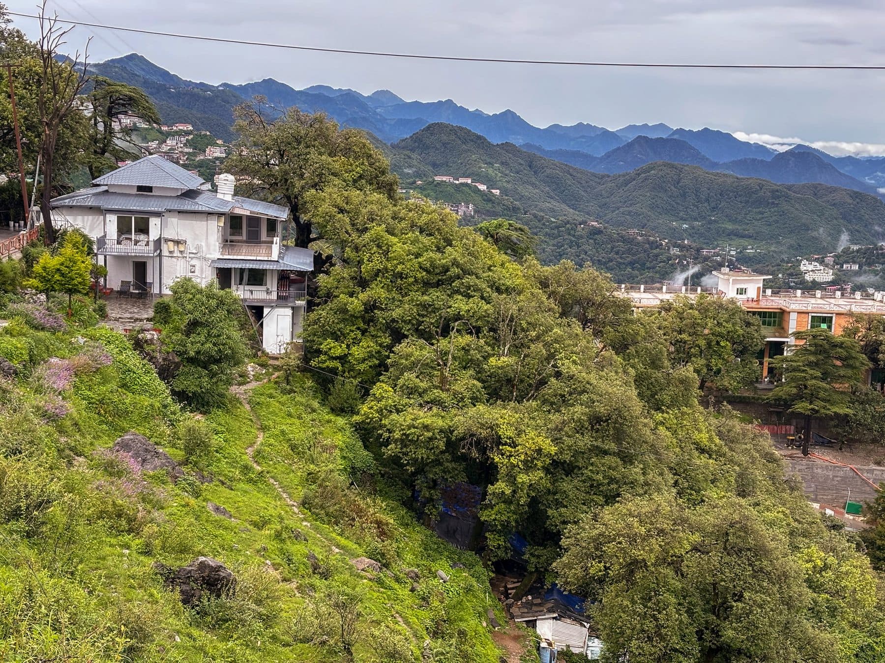 The house on its ridge, the ranges behind at Shail Shikhar Cottage, Mussoorie