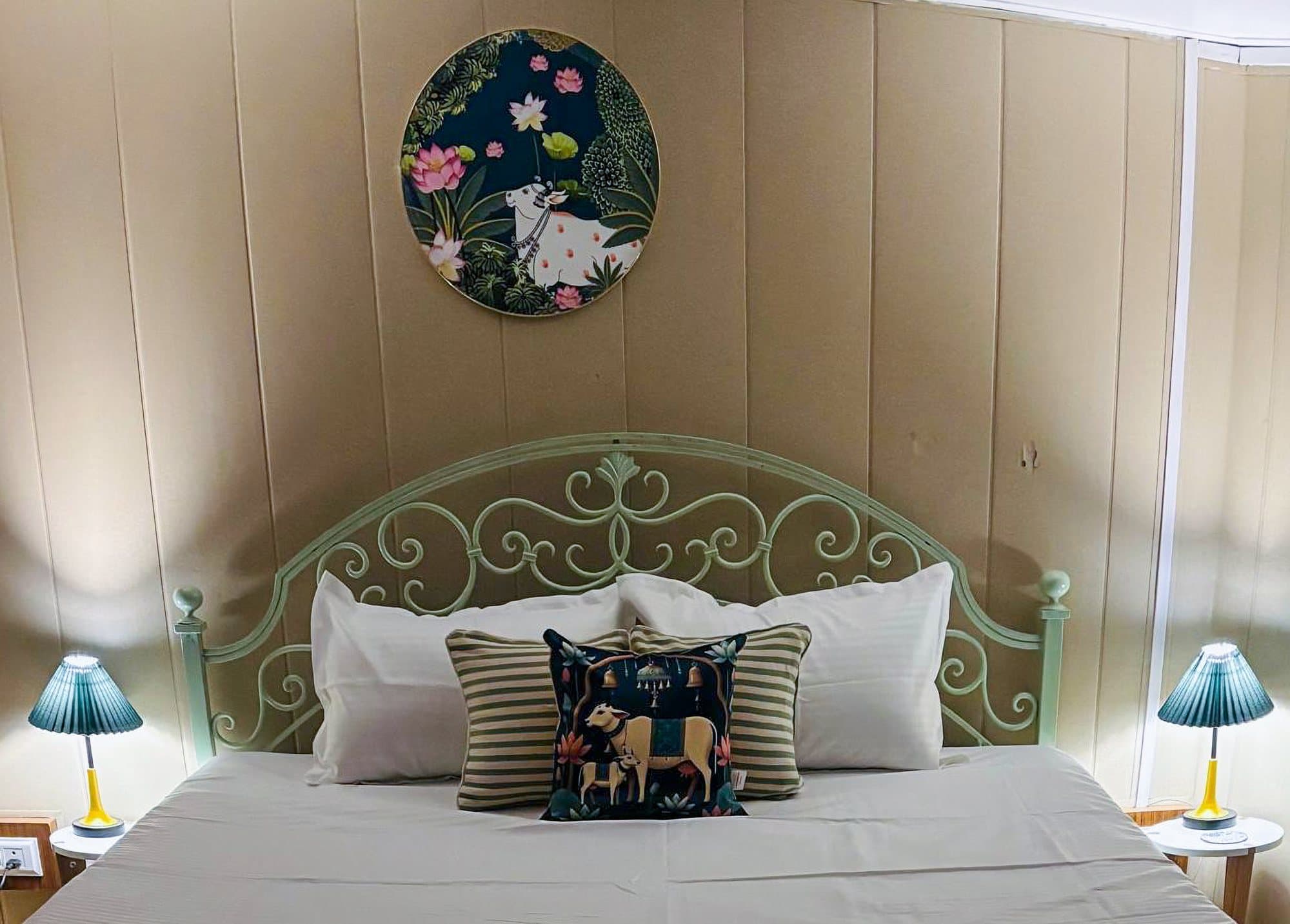 A lotus-pond Pichwai on a round canvas at Shail Shikhar Cottage, Mussoorie