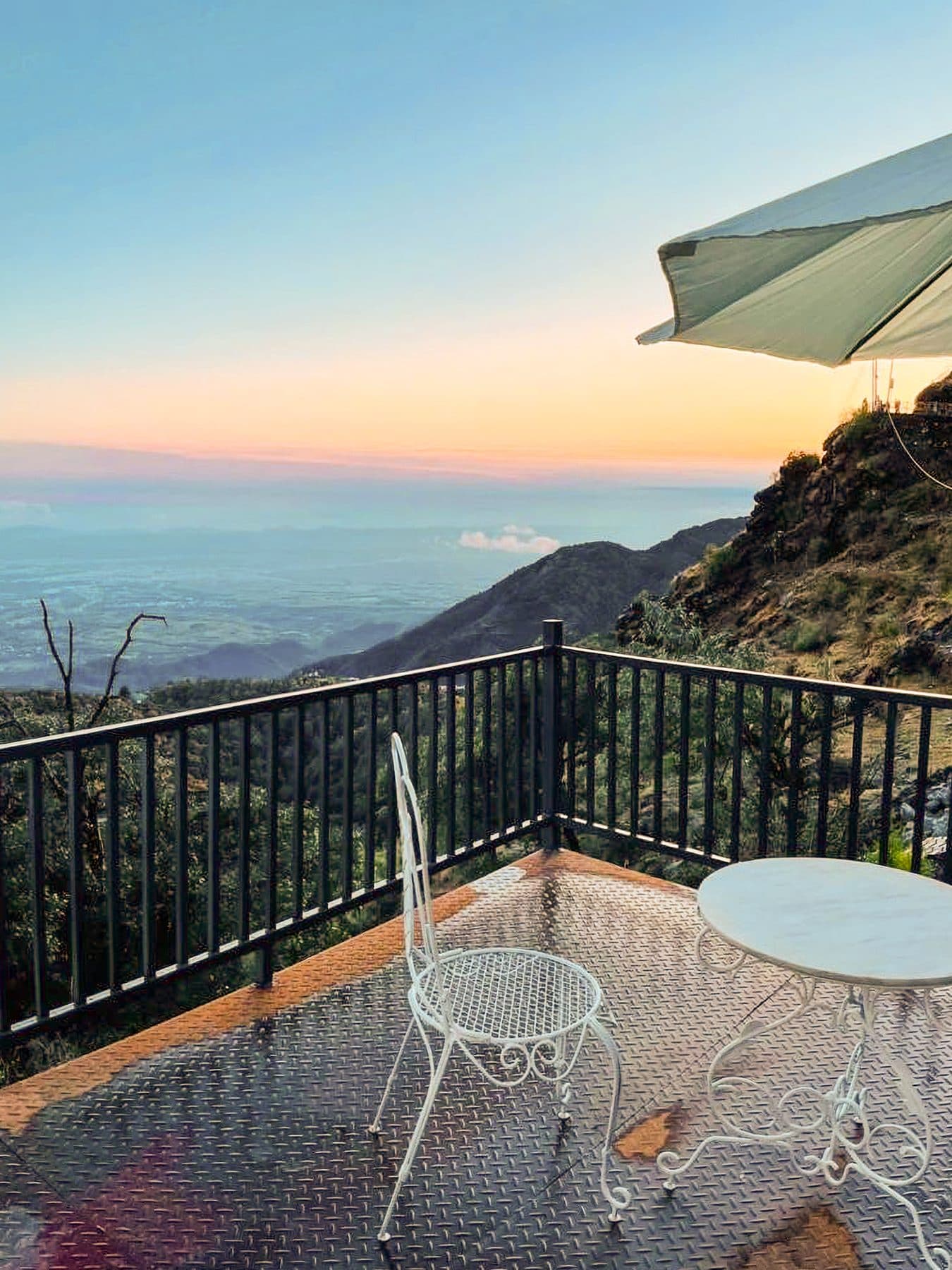 A room's terrace at dusk at Shail Shikhar Cottage, Mussoorie