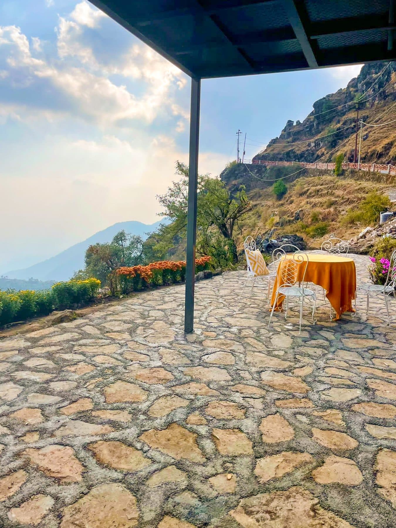 A table laid on the terrace, morning at Shail Shikhar Cottage, Mussoorie